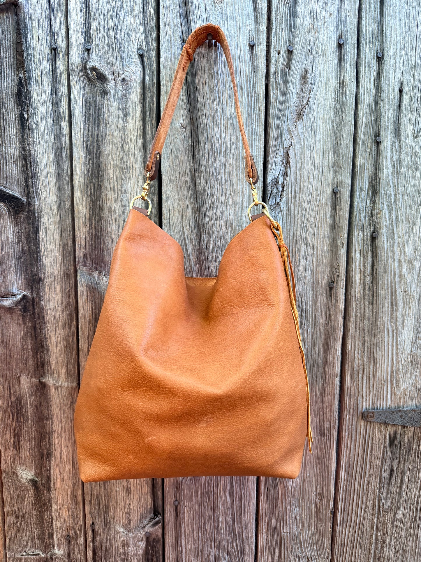 Barcelona Soft Bucket in Paddy Cake Tan Leather with Cider Suede Tassel