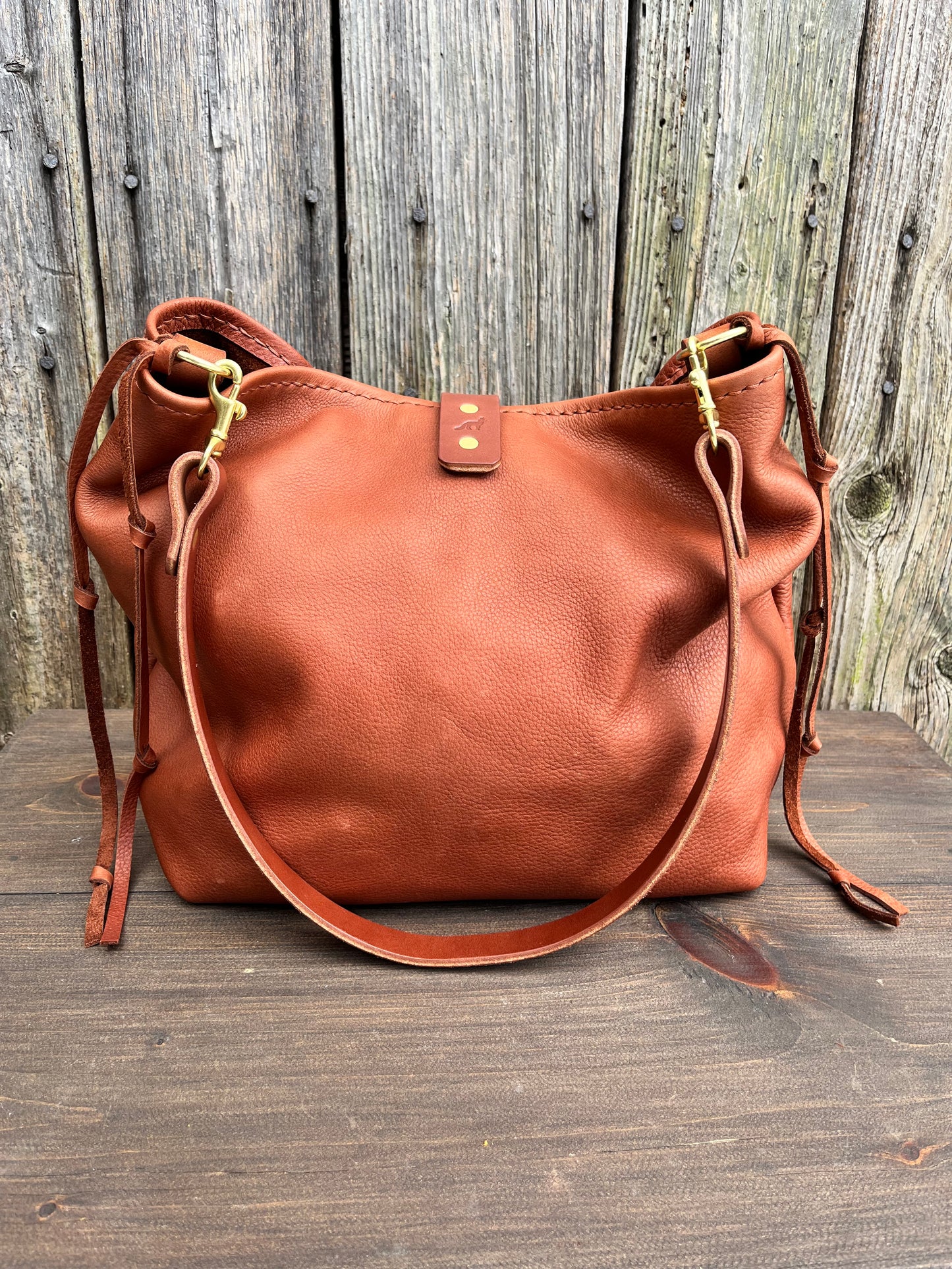 Mimi Slouch Bag in Brandy Naked Cow with Leather Tassel Closure