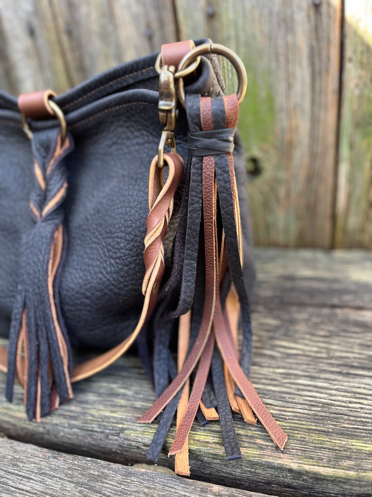 Mimi Slouch Bag in Distressed Black Bison with Braided Throwover Leather Tassel