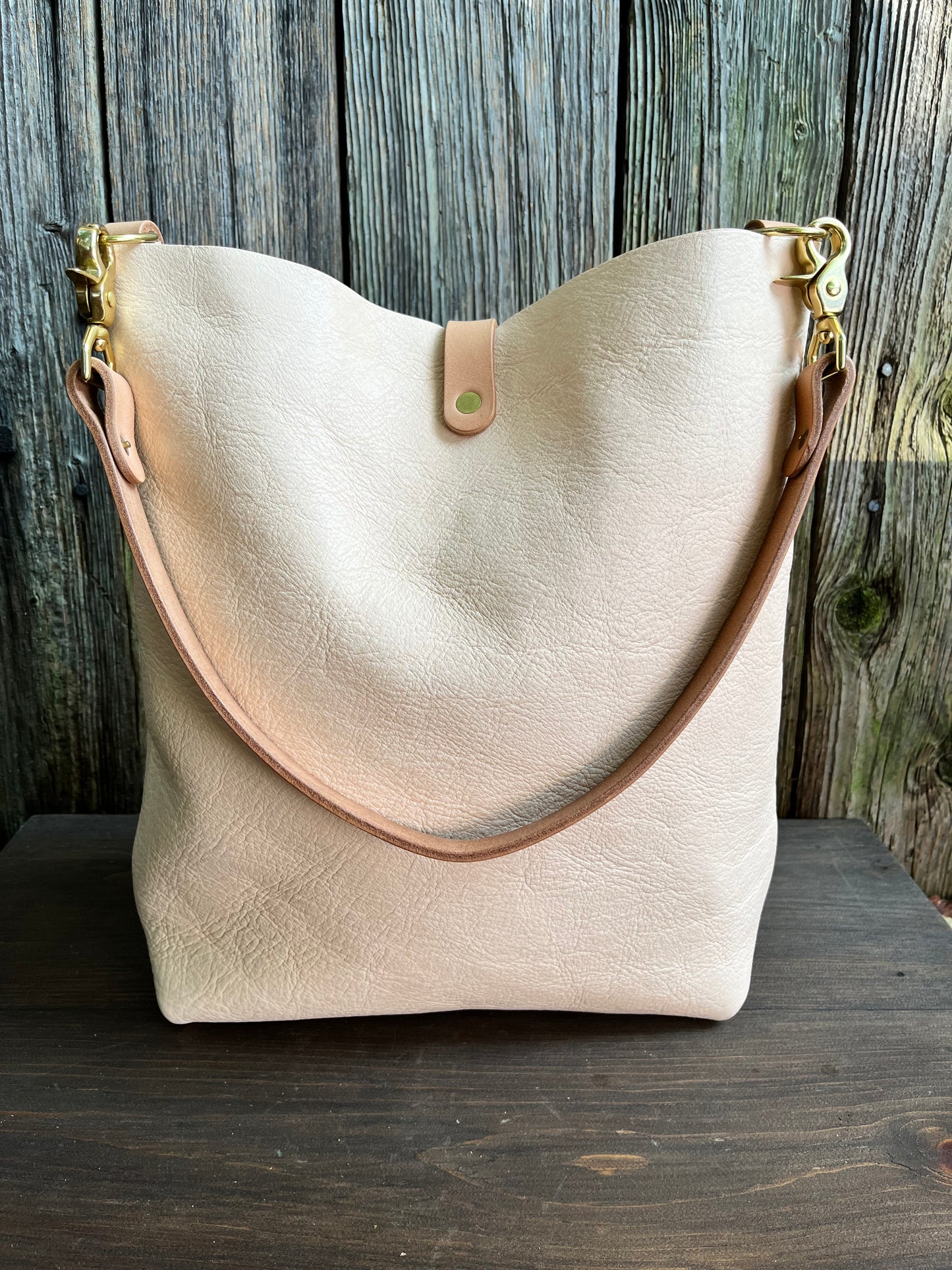 Barcelona Bucket in Natural Milled Veg Tan with Throwover Braided Tassel