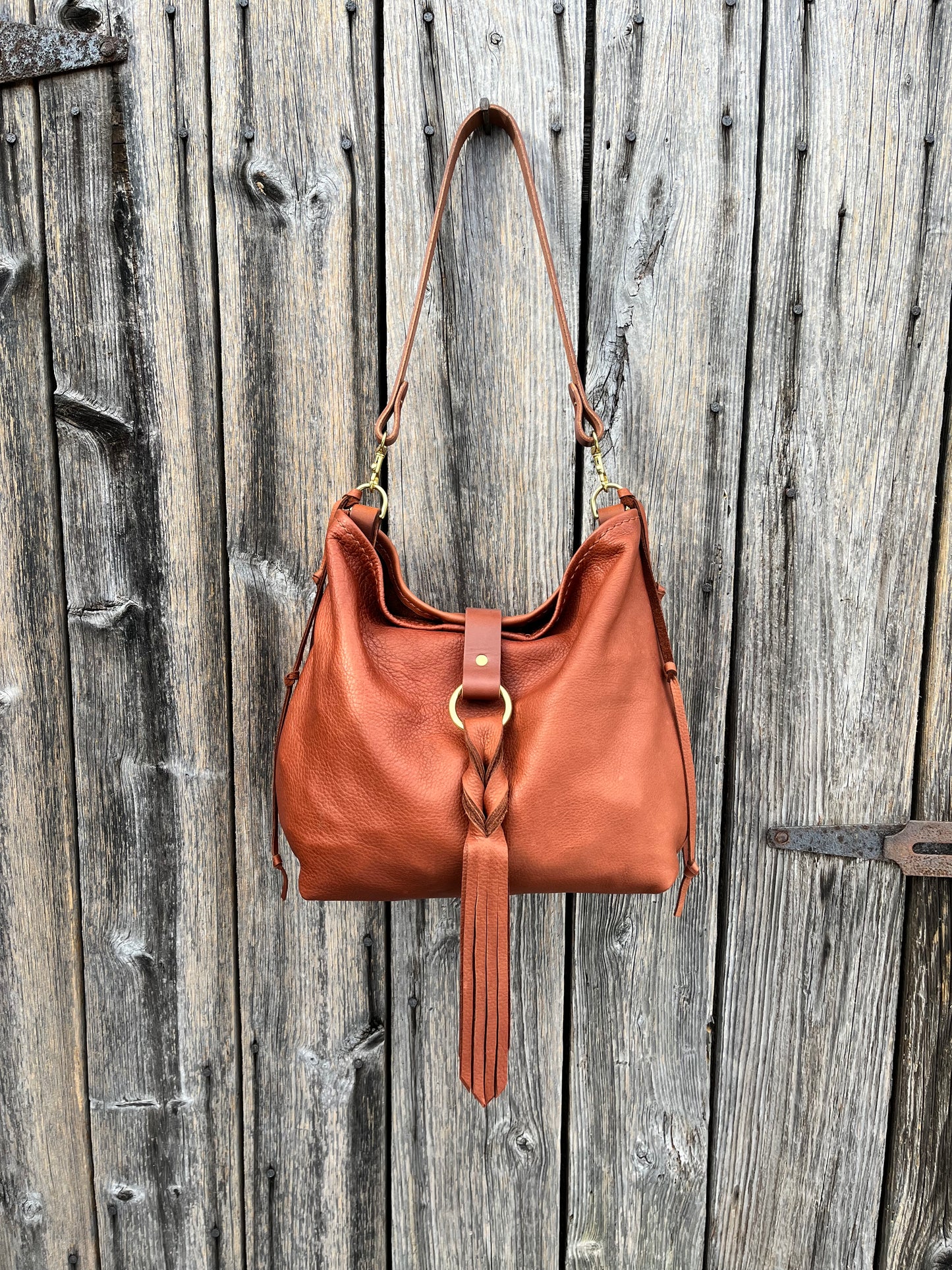 Mimi Slouch Bag in Brandy Naked Cow with Leather Tassel Closure