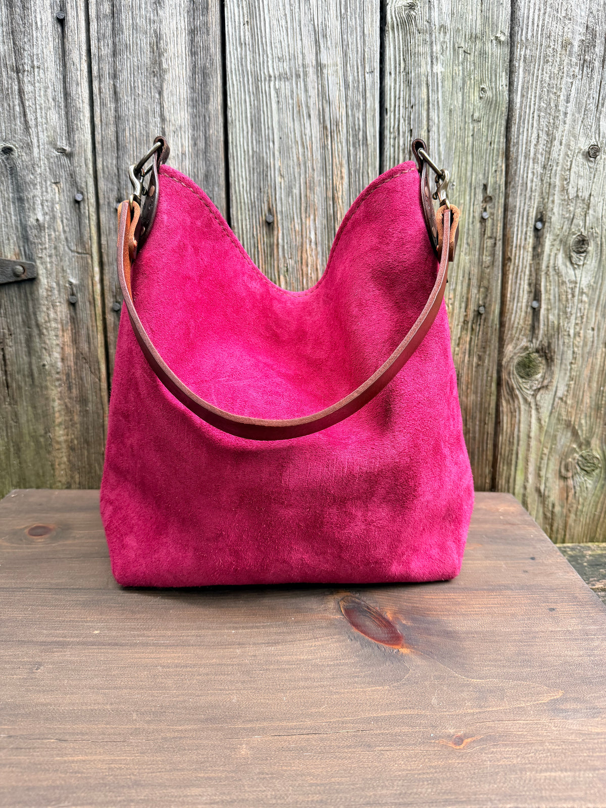 Willy Bucket in Reverse Cow in Cranberry Suede with Guitar Strap