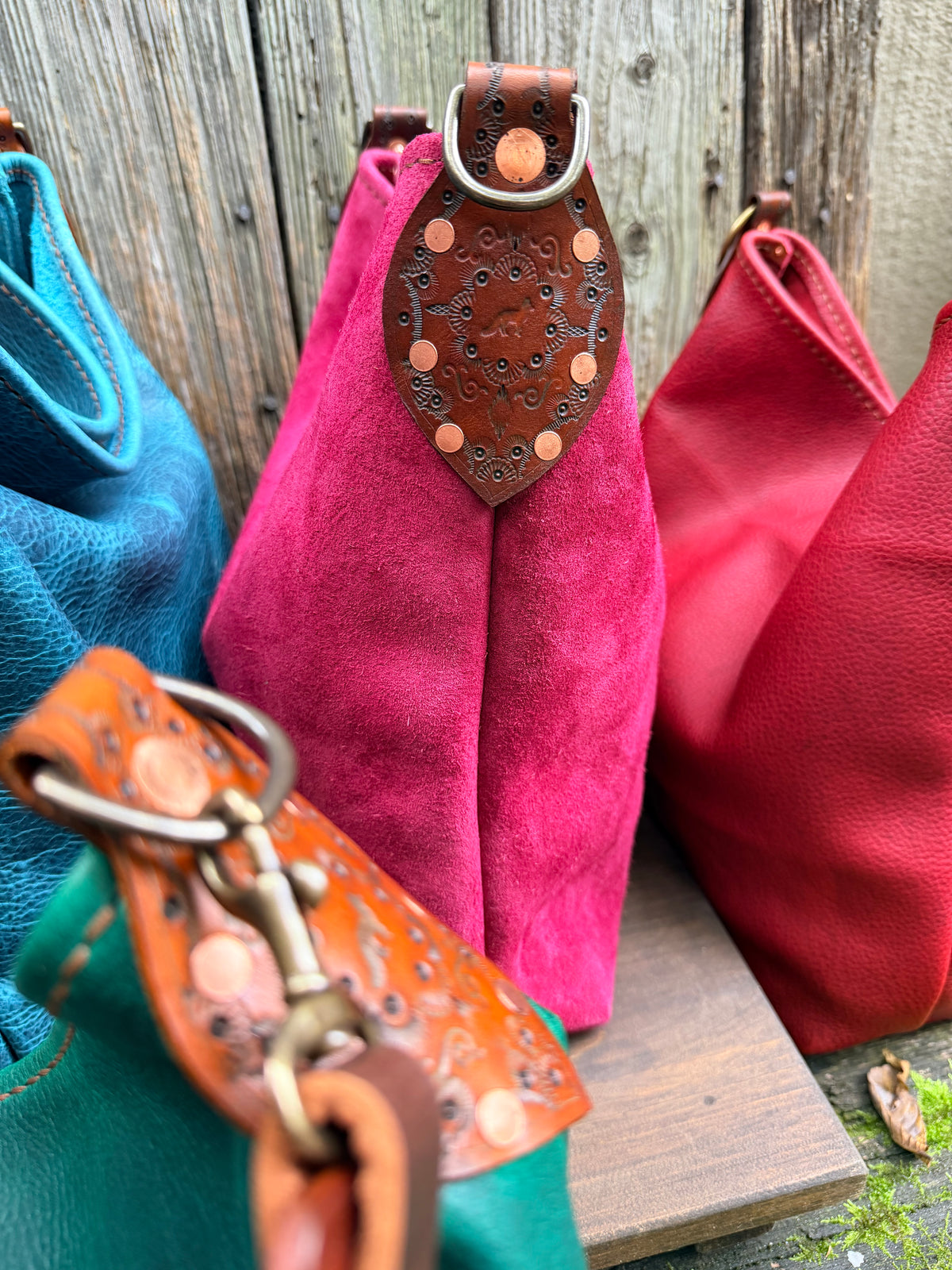 Willy Bucket in Reverse Cow in Cranberry Suede with Guitar Strap